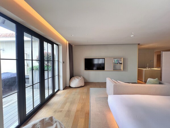 Luxury Suite, 1 Queen Bed, Patio, City View | Laptop workspace, blackout curtains, free WiFi