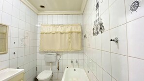 Shower, towels, soap, toilet paper