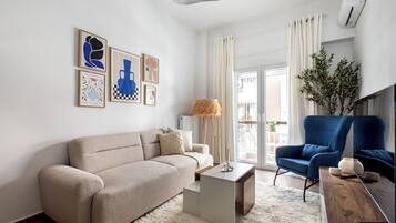 Apartment, 1 Bedroom, Kitchen, City View | Living room | 43-inch Smart TV with digital channels, streaming services