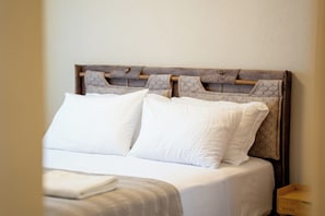 3 habitaciones, tabla de planchar con plancha, wifi y ropa de cama