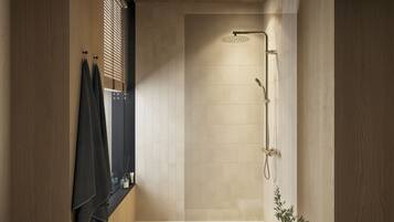 Shower, hair dryer, slippers, towels