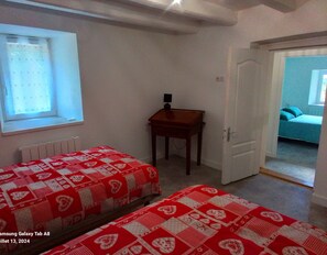 2 bedrooms, desk, iron/ironing board, travel crib