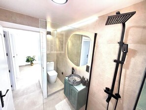 Hair dryer, towels, soap, toilet paper