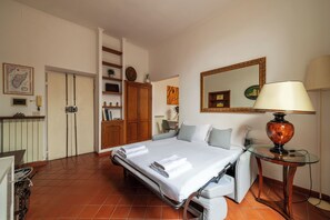Apartment, 1 King Bed, Balcony | Living area | 43-inch Smart TV with digital channels - Modern Apt near Piazza di Spagna (Rome)