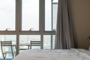 City Condo, Balcony, City View | Iron/ironing board, free WiFi - Uptown Park Suites Tower 2 (Taguig)