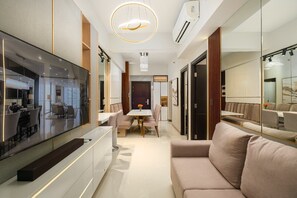 Appart'hôtel Luxe, balcon, vue ville | Coin séjour