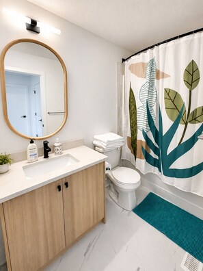 Hair dryer, towels, soap, shampoo - Sol & Sandstone – Mykonos-Inspired Modern Retreat (Cochrane)