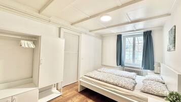 Desk, laptop workspace, blackout curtains, iron/ironing board