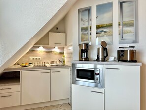 Fridge, microwave, stovetop, coffee/tea maker