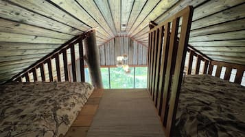1 bedroom, desk, travel crib, bed sheets