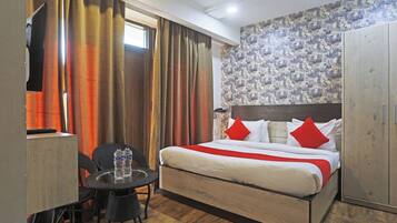 Kahden hengen deluxe-huone, näköala puutarhaan | Egyptinpuuvillaiset lakanat, ylelliset vuodevaatteet, untuvapeitot