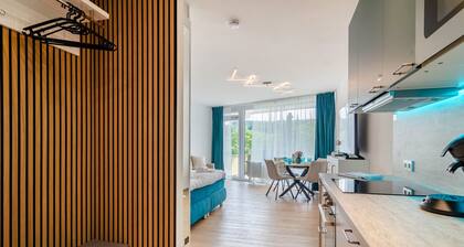 Appartement 'Mainaublick - Luxe, piscine et sauna' avec balcon et WLAN