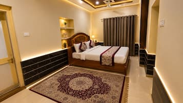 Individually decorated, desk, laptop workspace, rollaway beds