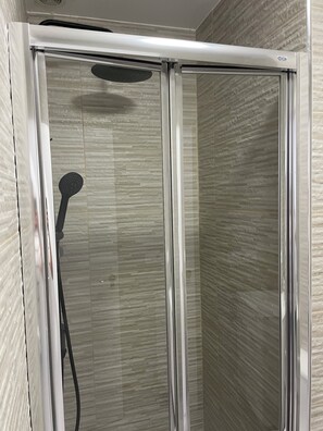 Shower, towels, soap, shampoo