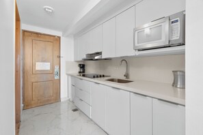 Microwave, stovetop, dishwasher, coffee/tea maker