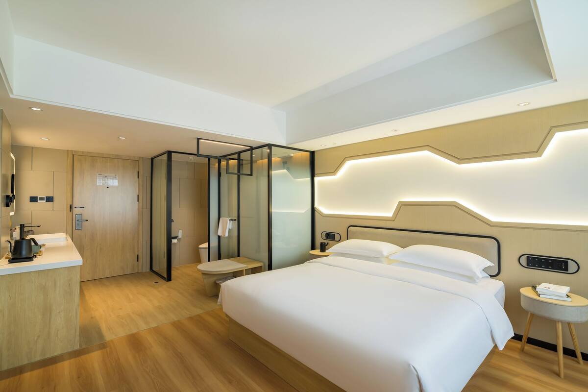 Premium bedding, down duvets, pillow-top beds, free minibar