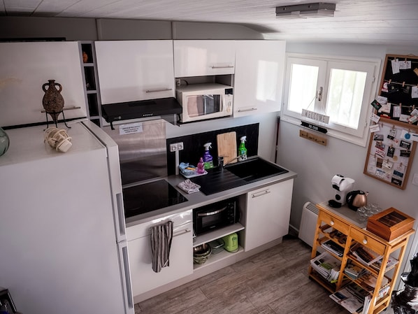 Full-sized fridge, microwave, espresso maker, coffee/tea maker