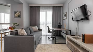 Klassiek appartement, uitzicht op stad | Een strijkplank/strijkijzer, gratis wifi