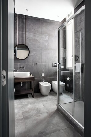 Deluxe Apartment | Living area | 24-inch Smart TV with cable channels