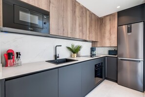 ميكروويف، فرن، موقد طهي مسطح، غسالة أطباق