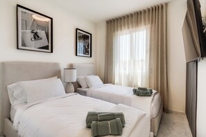 2 عدّة غرف نوم ومكواة/لوح كي وواي فاي مجانًا وملاءات أسرّة