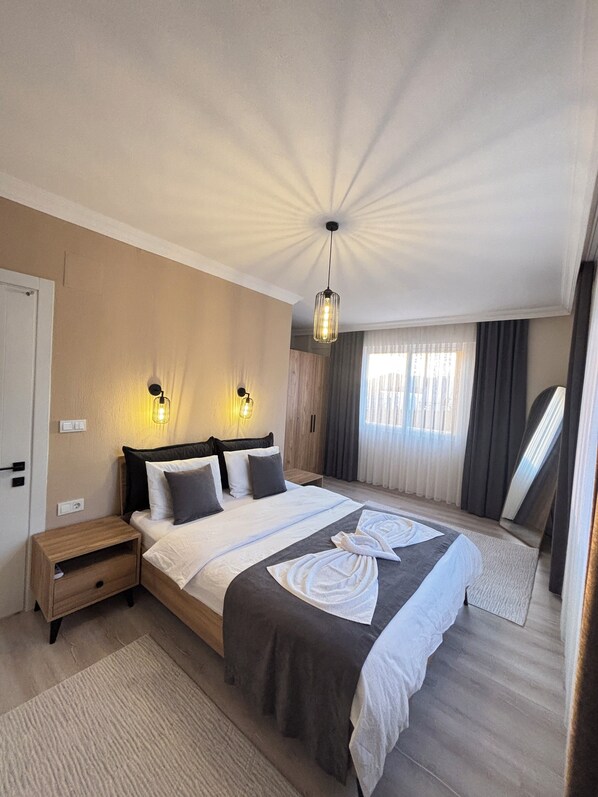 2 habitaciones, tabla de planchar con plancha, wifi y ropa de cama