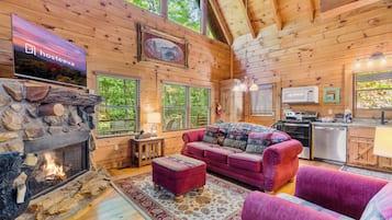 Signature Cabin, 2 Bedrooms, Hot Tub, Mountain View | Living room | 40-inch Smart TV with digital channels, fireplace