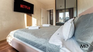 Deluxe-íbúð - 1 svefnherbergi - fjallasýn | Rúmföt af bestu gerð, rúm með memory foam dýnum, myrkratjöld/-gardínur