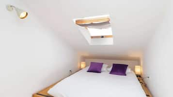 1 bedroom, desk, iron/ironing board, travel crib