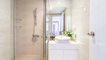 Panoramic Apartment, 1 Bedroom, Balcony, City View | Bathroom | Combined shower/tub, hair dryer, slippers, towels