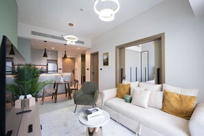 Deluxe Apartment, Balcony | Living area