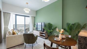 Appartement Deluxe, balcon | Coin séjour