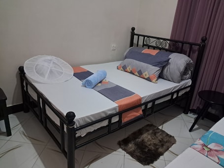 Comfort Shared Dormitory | Desk, blackout drapes, iron/ironing board, free WiFi