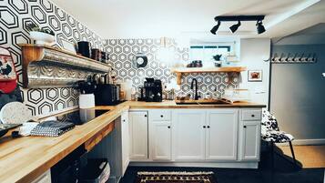 Fridge, microwave, coffee/tea maker, toaster