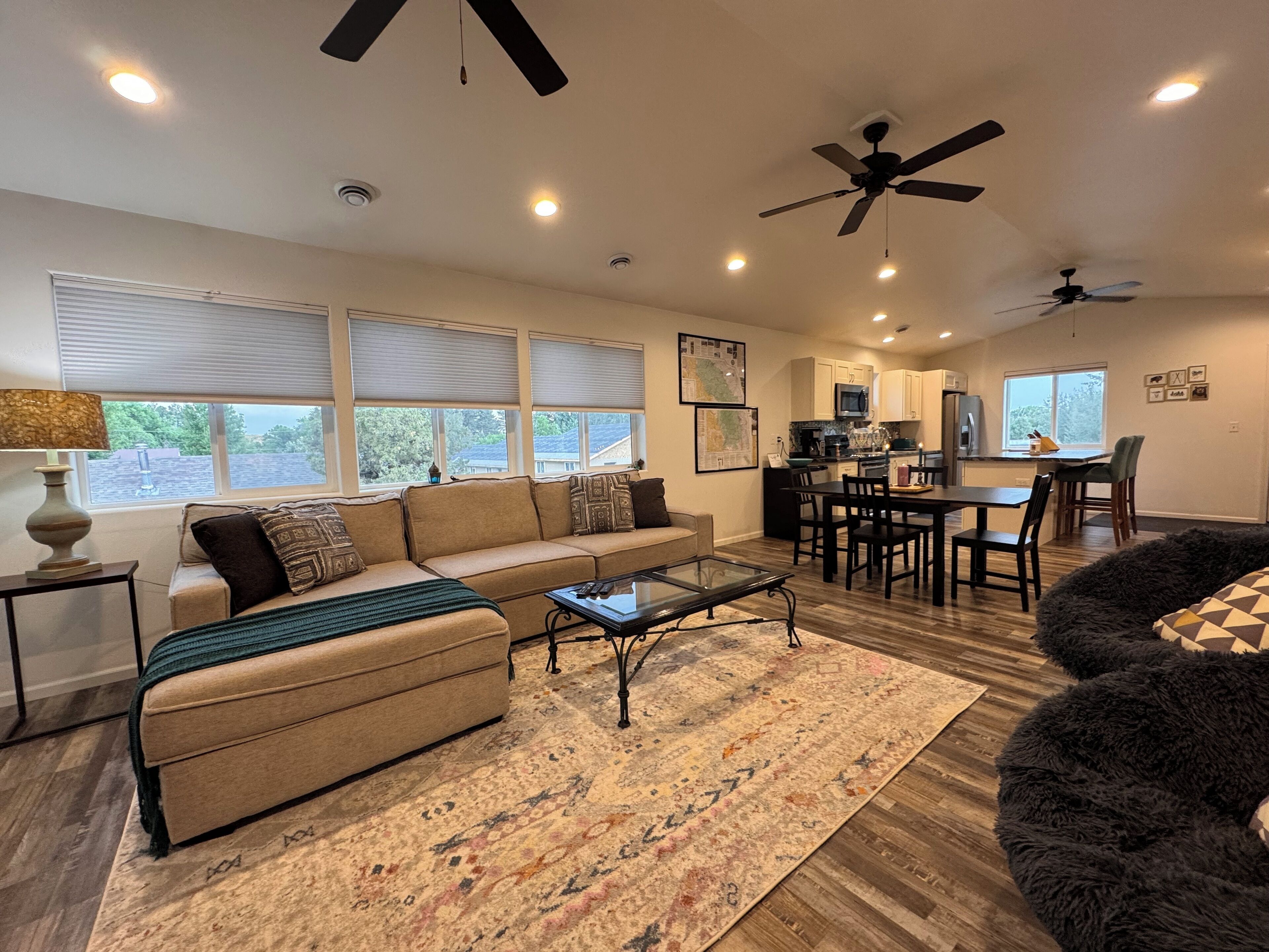 Living room, dining room and kitchen areas.