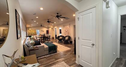 Discover our inviting 3-bdrm, 2-bathroom home, ideally situated near fairgrounds, hospital, VA, & downtown Sheridan. This newer-built residence offers all the comforts & conveniences you need for a pleasant stay, making it perfect for longer stays.