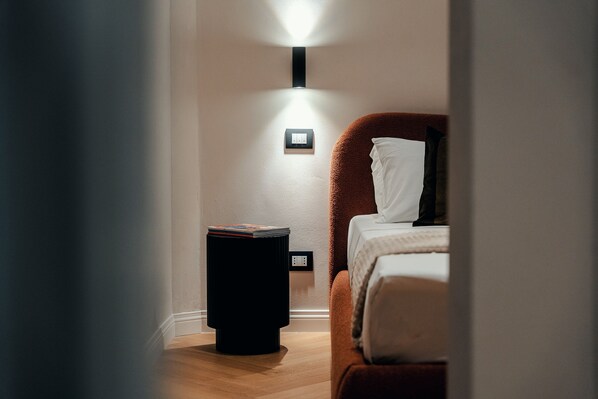Premium bedding, down duvets, memory-foam beds, in-room safe