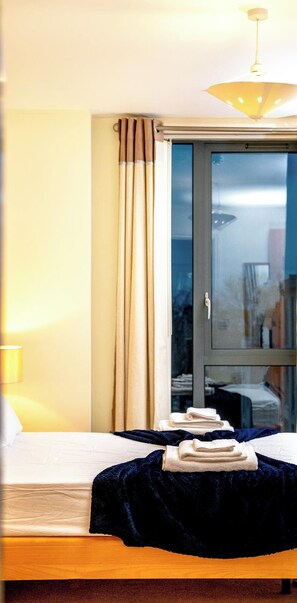 1 غرفة نوم ومكواة/لوح كي وواي فاي وملاءات أسرّة