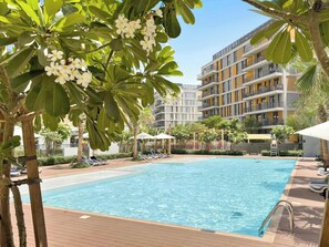 Pool - Stylish 1BR in Production City with pool and gym (Dubai)