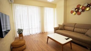 Familienapartment, Stadtblick | Wohnbereich