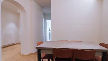 Standard Apartment | Living area | 32-inch flat-screen TV with satellite channels