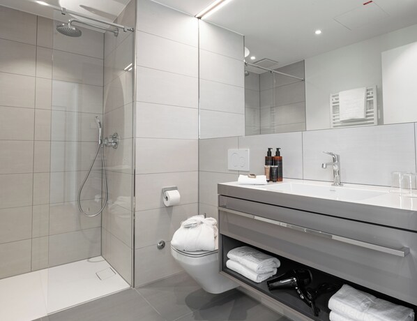 Shower, towels, soap, toilet paper