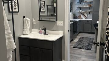 Shower, towels, toilet paper