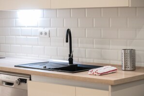 Mikrobølgeovn, opvaskemaskine, kaffe-/temaskine