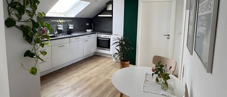 Fridge, microwave, stovetop, coffee/tea maker