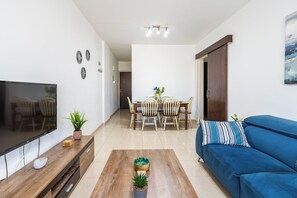 Apartment, 2 Bedrooms, City View | Living room | 42-inch Smart TV with digital channels, streaming services - Apollo 2-Bedroom Apartment in Larnaca (Larnaca)