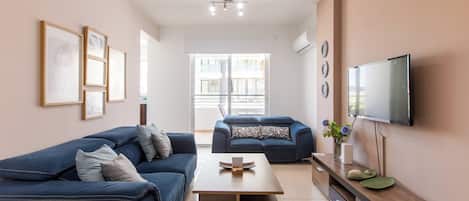 Apartment, 2 Bedrooms, City View | Living room | 42-inch Smart TV with digital channels, streaming services