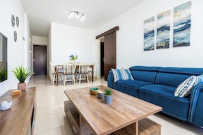 Apartment, 2 Bedrooms, City View | Living room | 42-inch Smart TV with digital channels, streaming services