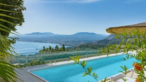 A swimming pool with a view of a city and mountains in the background. - Villa Vollard Panoramic Seaview Private Pool (Malevizi)