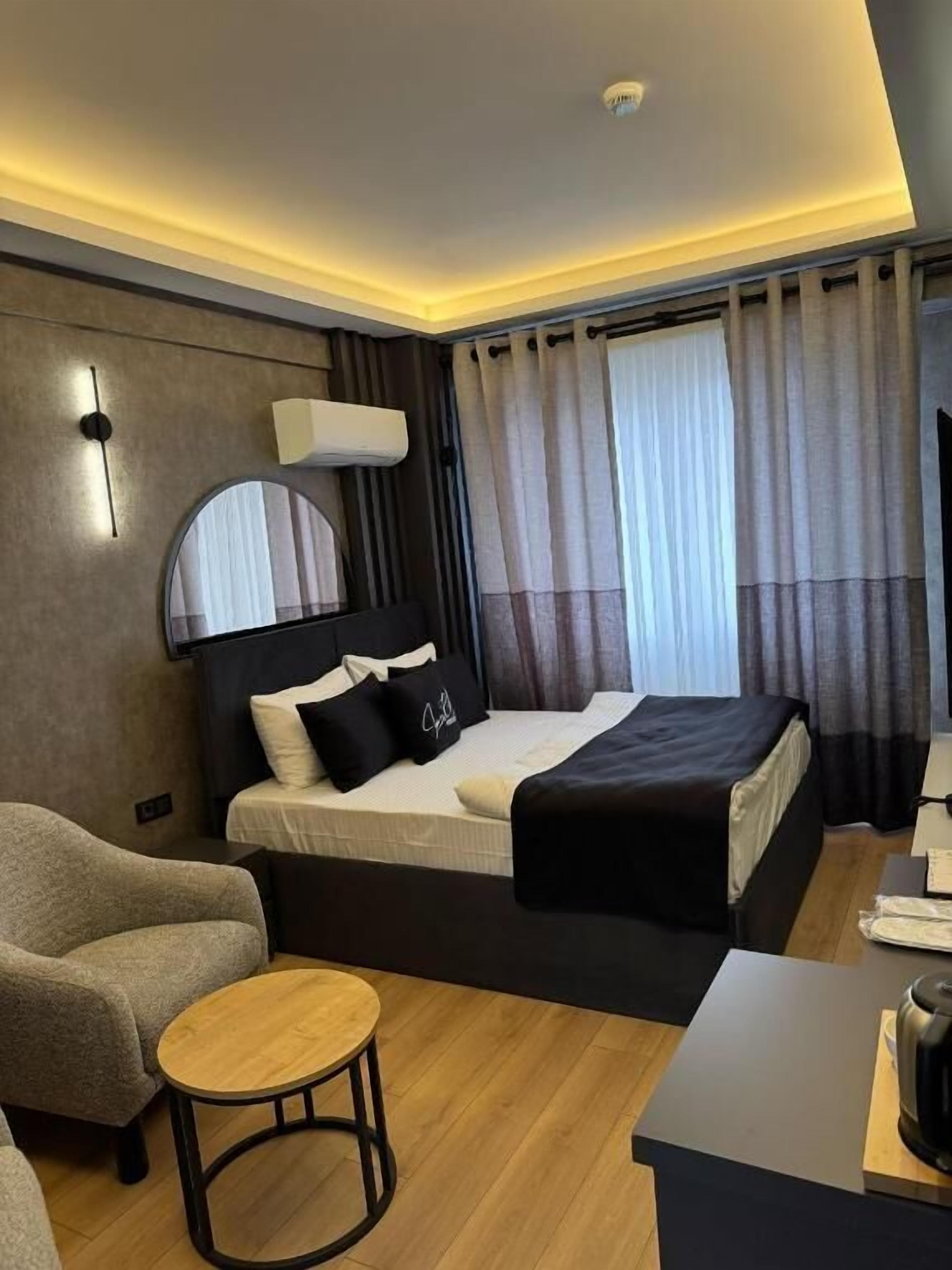 Free minibar items, desk, laptop workspace, blackout drapes